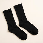 LYNE Mid-Tube Socks in Black, pair flat lay
