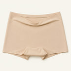 LYNE Under-Dress Safety Short in Nude, flat lay showing the narrow self-fabric top edge and gusset