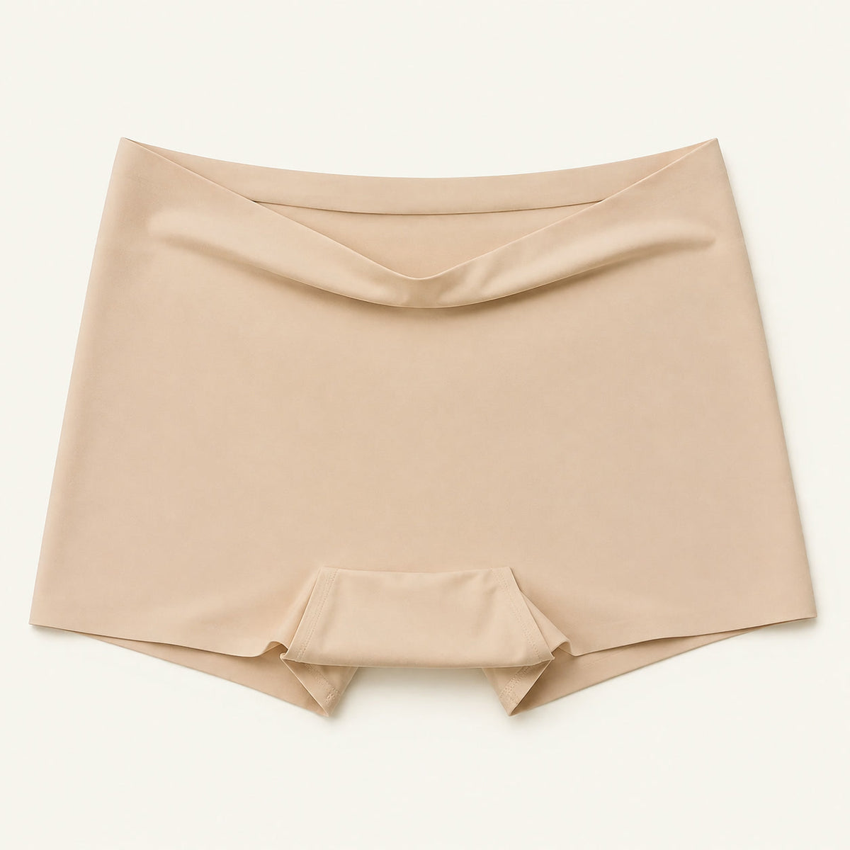 LYNE Under-Dress Safety Short in Nude, flat lay showing the narrow self-fabric top edge and gusset