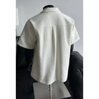 Back of the apricot shirt