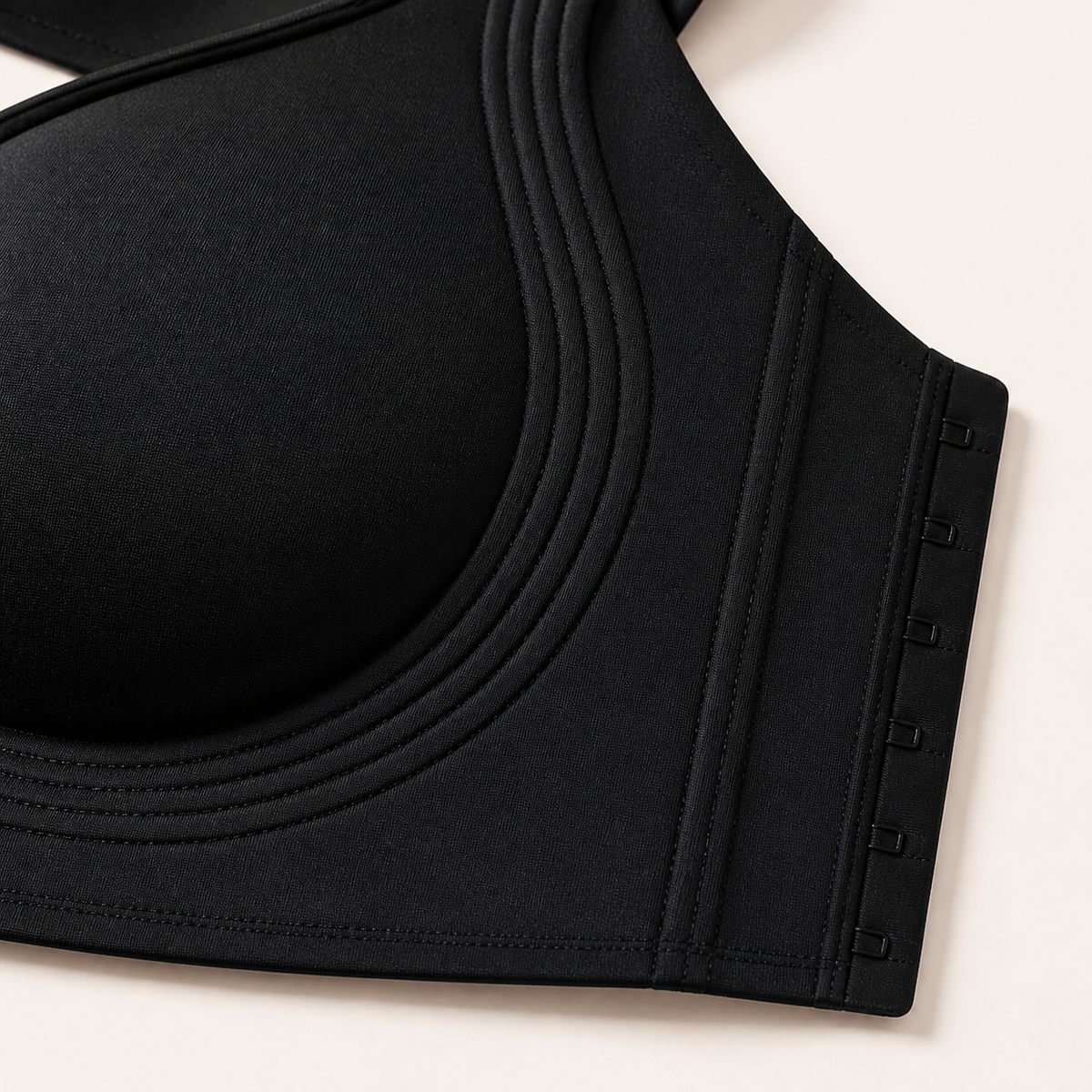 LYNE Everyday Soft Bra, side wing stitching and hook-and-eye closure detail