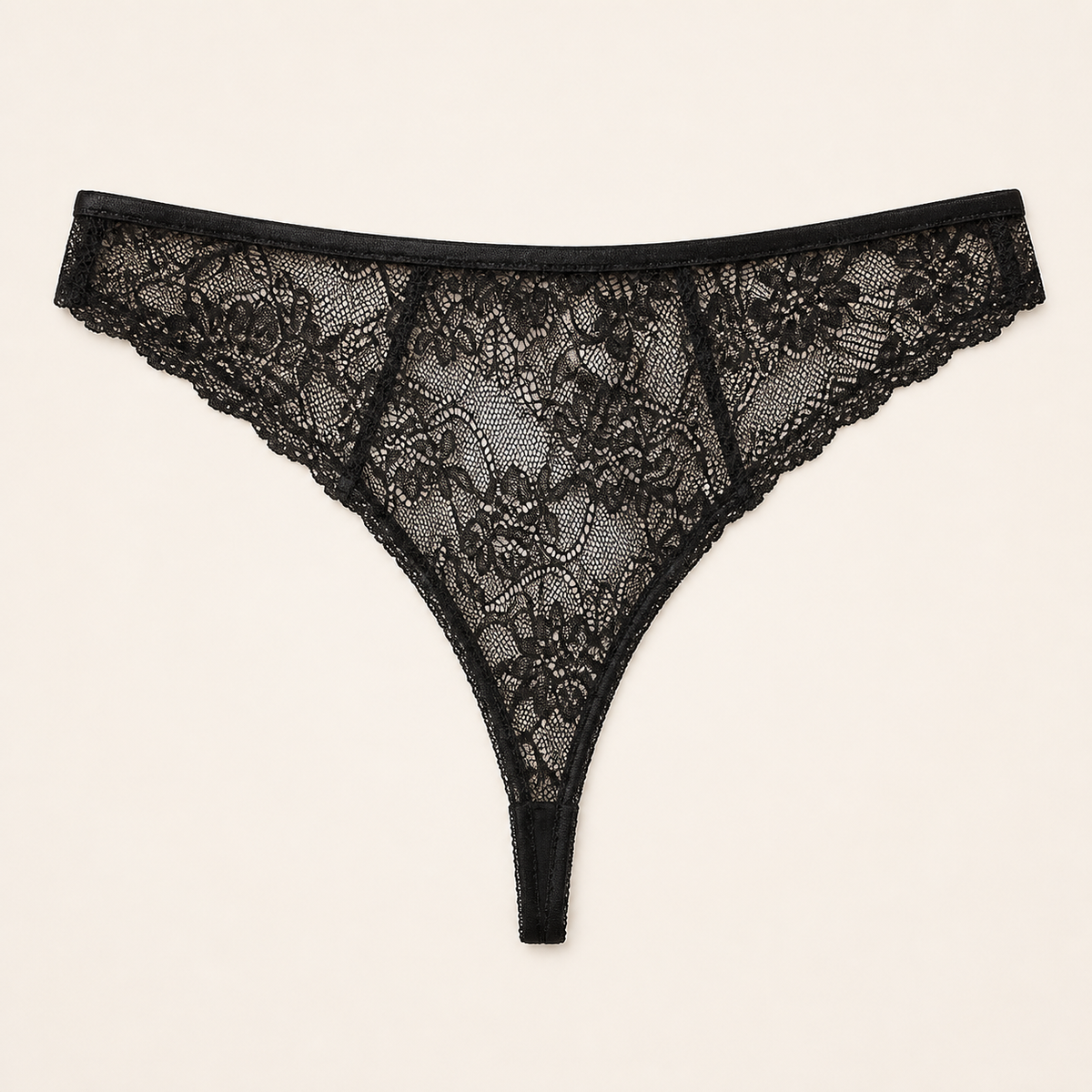 LYNE Sheer Lace Thong in black, all-over sheer floral lace with a narrow thong back