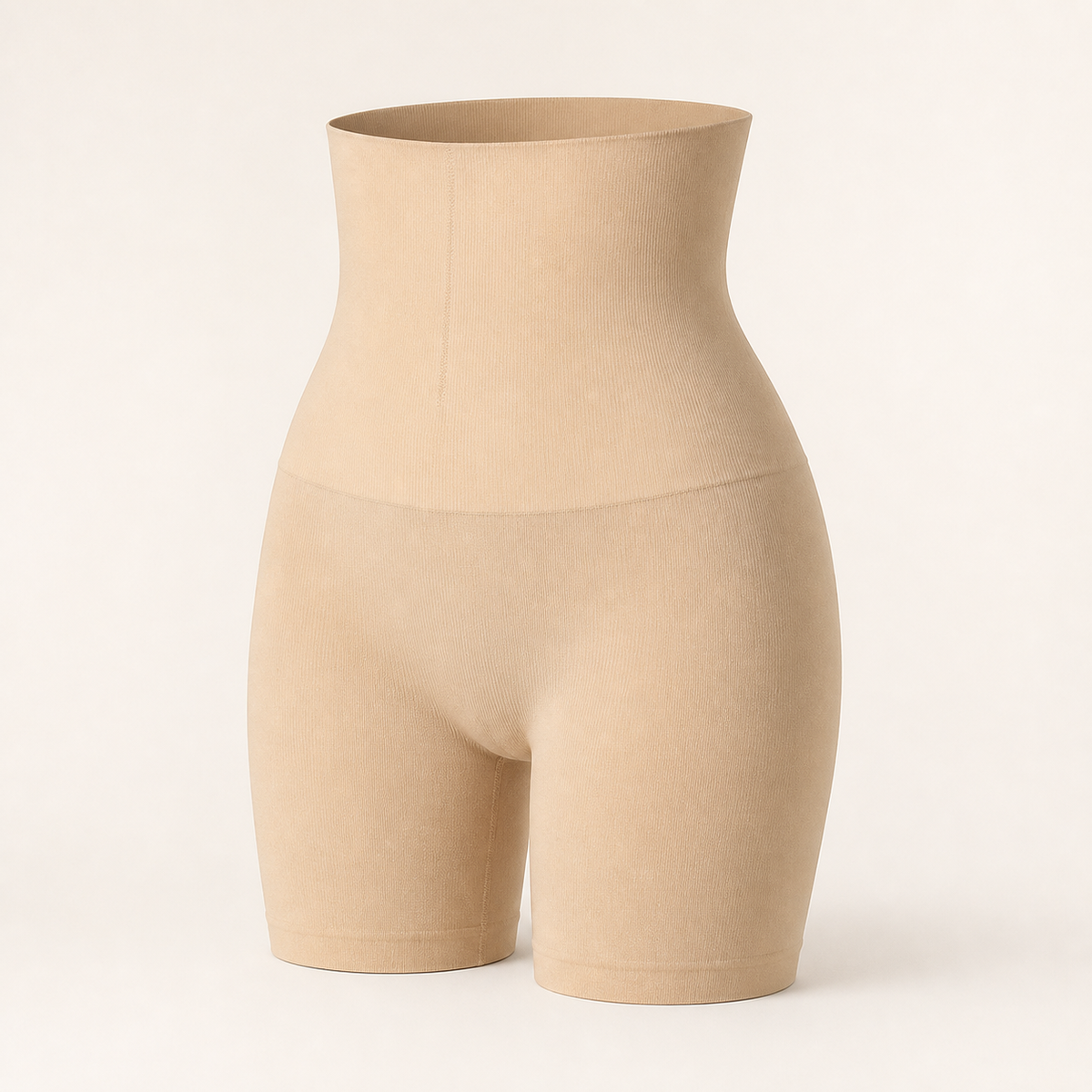 LYNE Core Sculpt Short in warm nude, very high-waisted shaping short, front three-quarter view