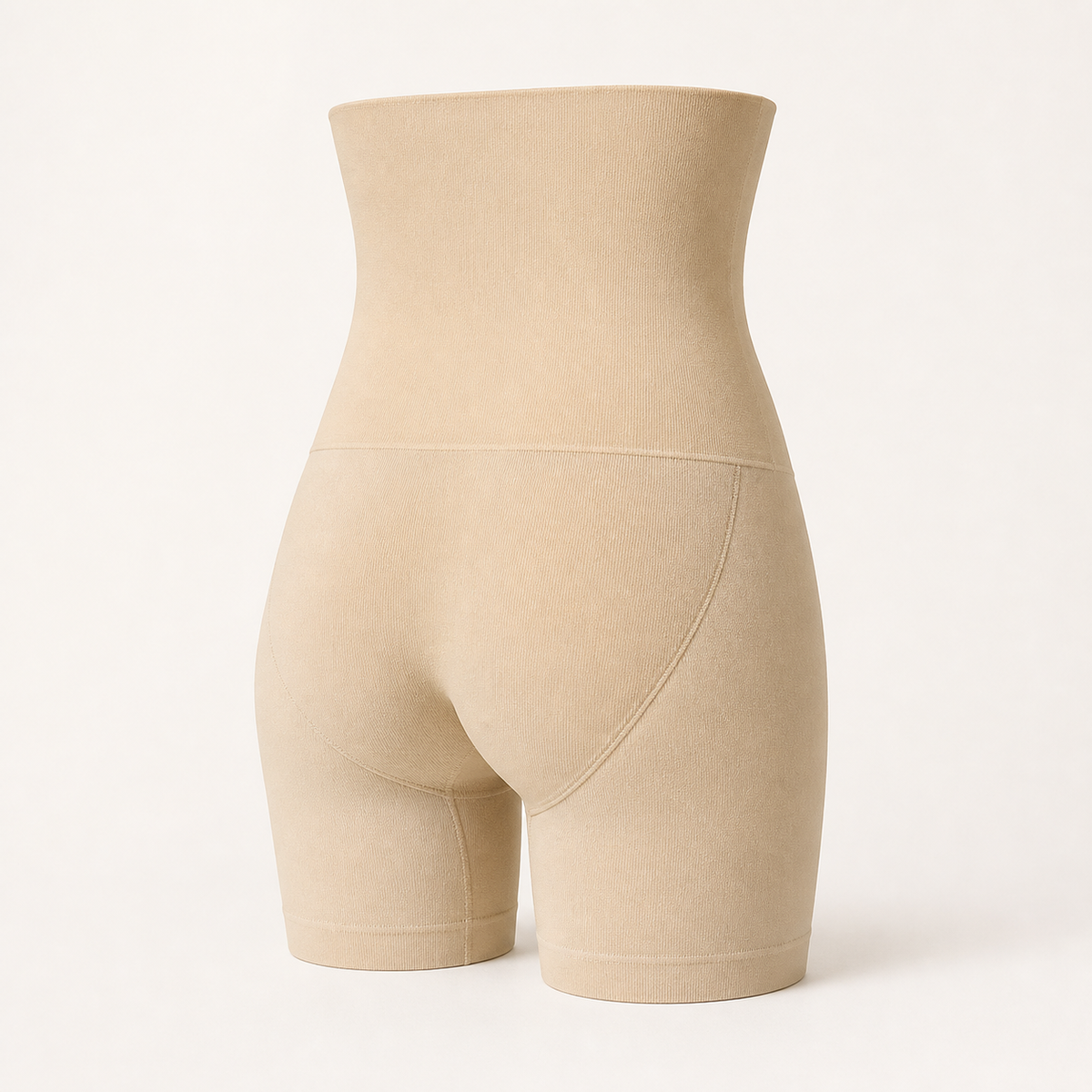 LYNE Core Sculpt Short, rear view showing the curved lifting seam under each hip and the seam across the high hip