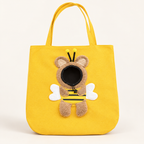 Yellow Bee pet tote with plush wings and a round front opening